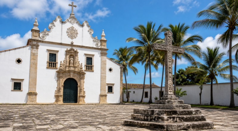The baroque facade and stone courtyard cross of Centro Cultural São Francisco in João Pessoa, Paraíba.