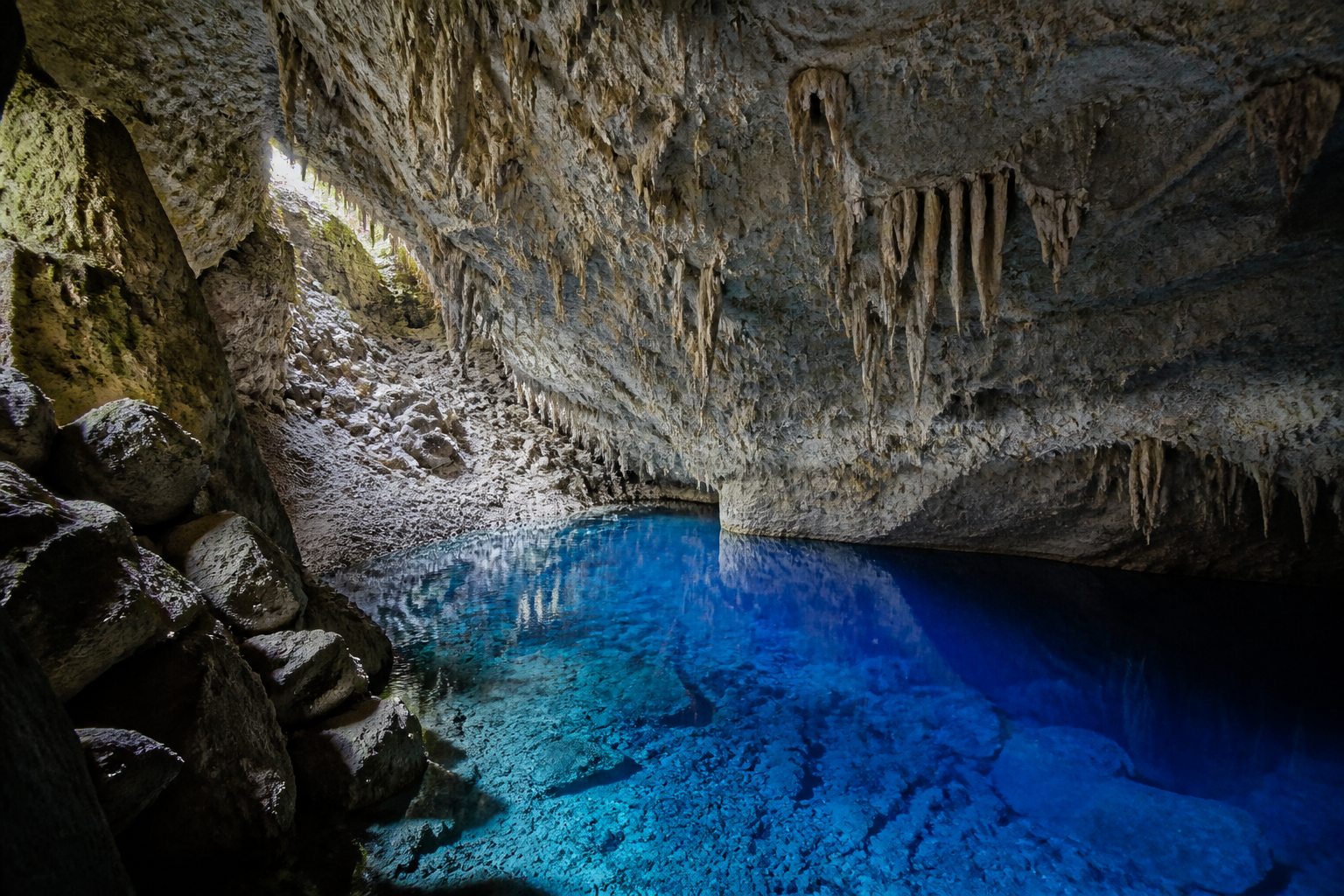 Gruta do Lago Azul cavern interior in Bonito Brazil showing subterranean turquoise lake and limestone stalactites