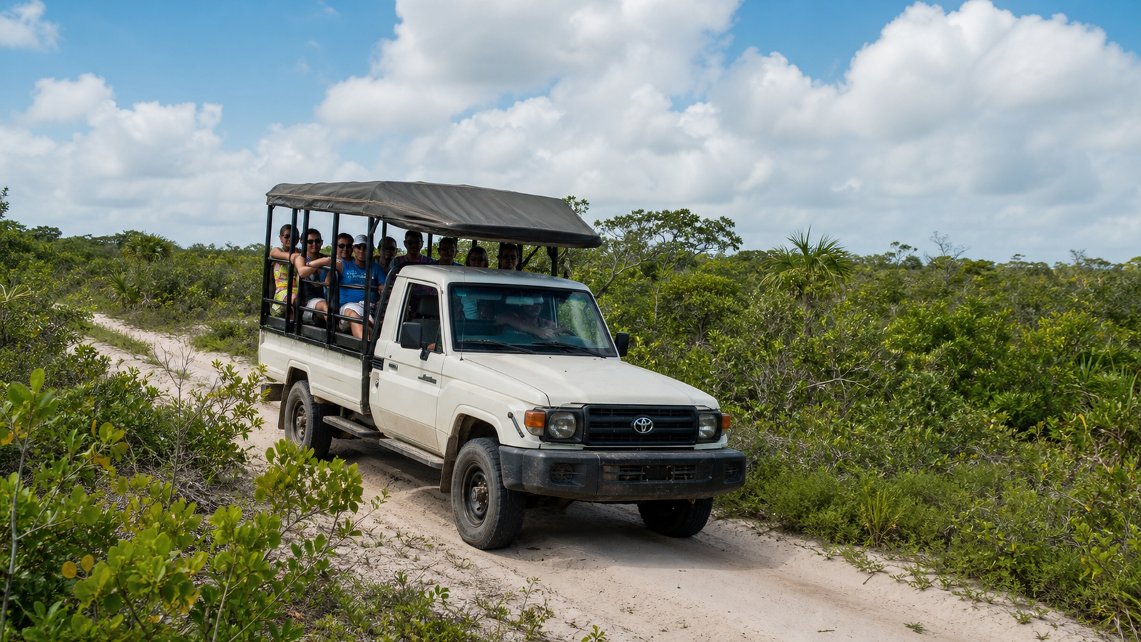Lagoa Azul and Lagoa Bonita: The Honest Guide to Visiting Both Without Wasting Time or Money 4 Open-sided 4x4 passenger truck driving through sandy trails in Lençóis Maranhenses