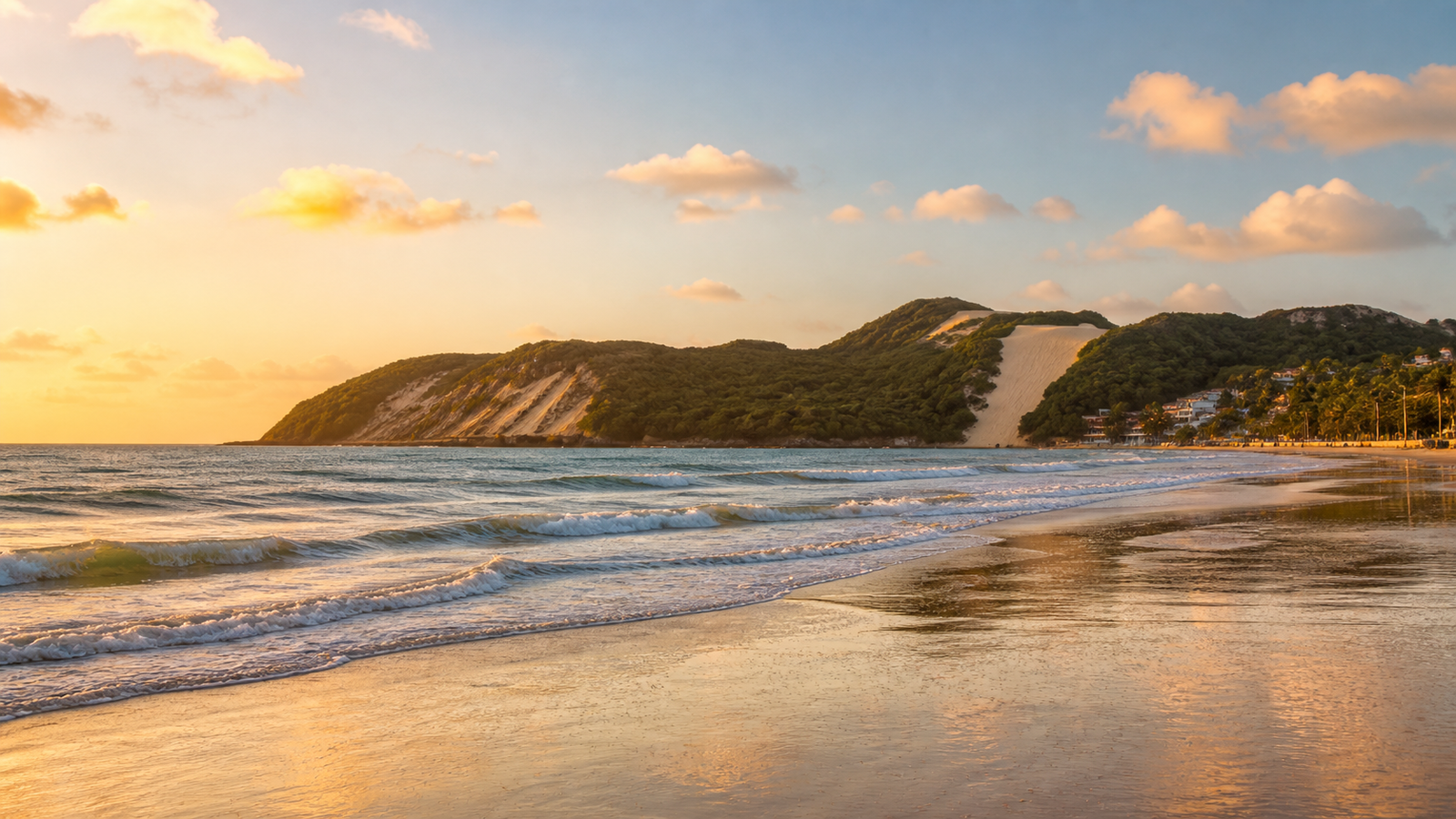 Morro do Careca in Natal: How to Visit Without Wasting Time or Money 4 Late afternoon golden hour view over Ponta Negra bay and the curve of Morro do Careca in Natal.