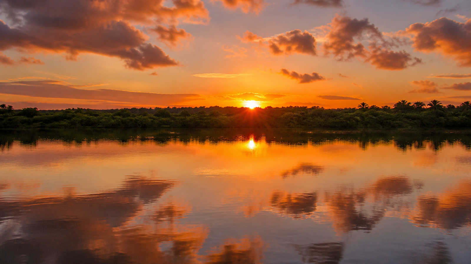 Praia do Jacaré Sunset Guide: How to Experience João Pessoa's Famous River Ritual Without Wasting Time or Money 1 Sunset over the calm waters of the Paraíba River estuary at Praia do Jacaré in Cabedelo near João Pessoa