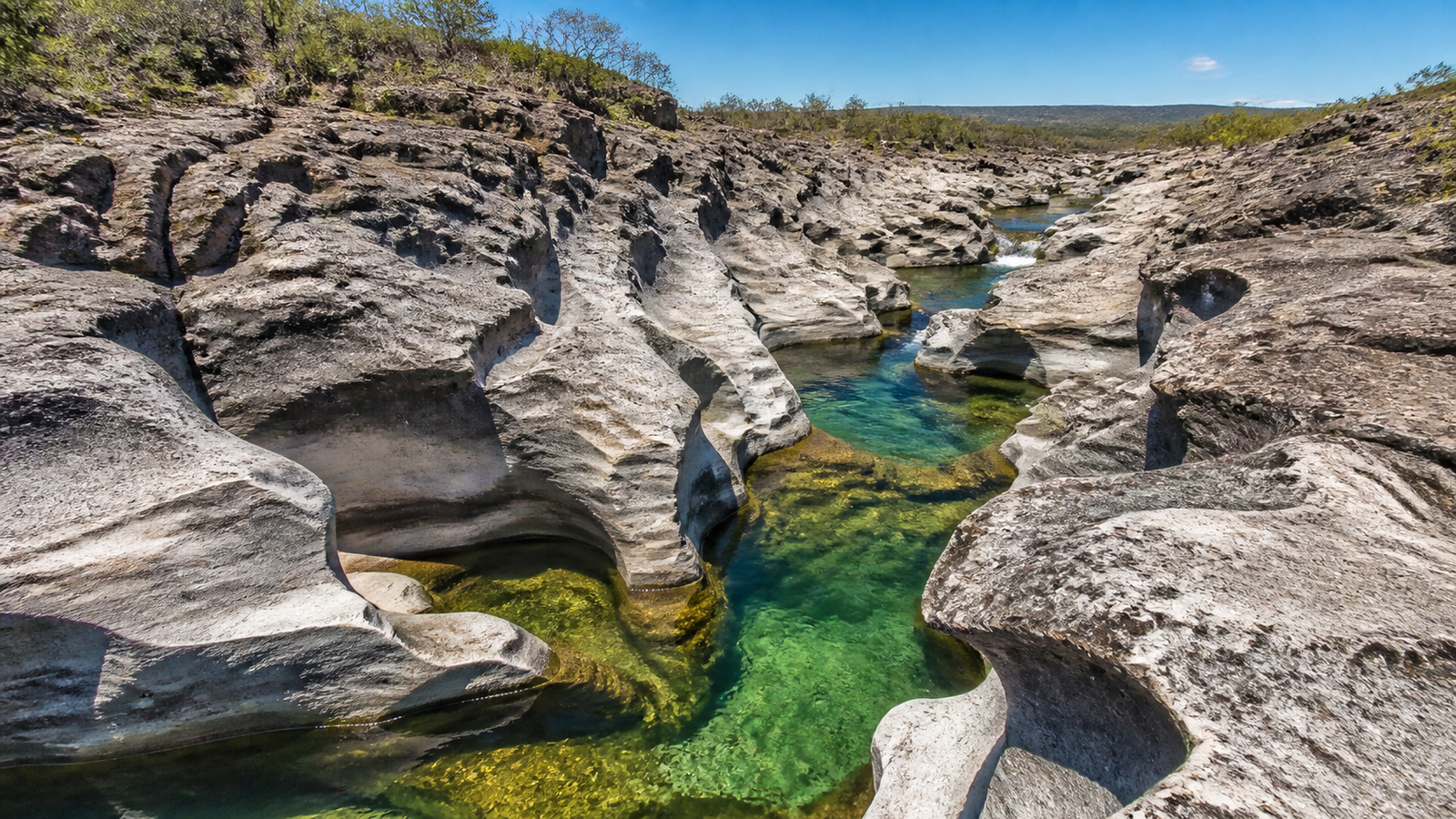 Surreal water-sculpted rock formations of Vale da Lua in Chapada dos Veadeiros
