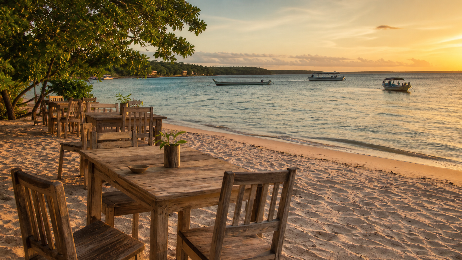 Beachfront restaurant with dining tables set directly on the white sand of Alter do Chão at sunset overlooking the Tapajós River