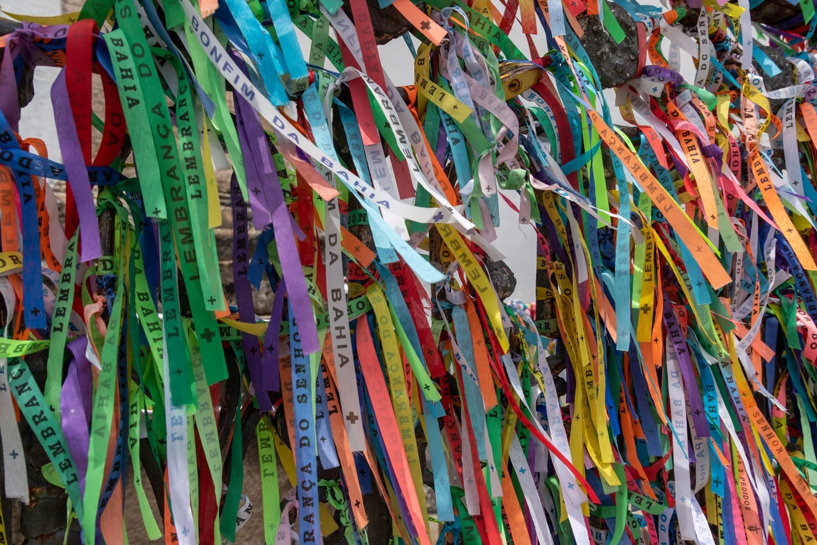 Colorful Senhor do Bonfim ribbons tied to the railings of the Bonfim church in Salvador, Brazil